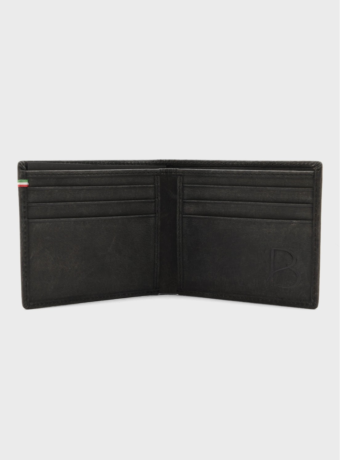 Billetera negra de cuero abierta con compartimentos para tarjetas vista frontal sobre fondo gris Billetera negra de cuero abierta con compartimentos para tarjetas vista frontal sobre fondo gris